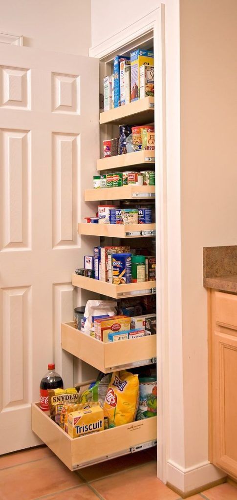 Pull-out shelves inside a pantry for enhanced storage.