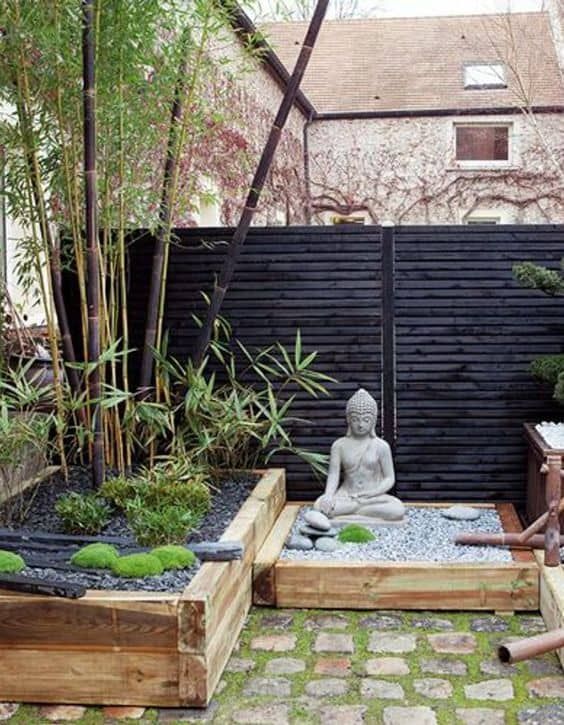 A Zen-inspired balcony garden with a Budha statue.