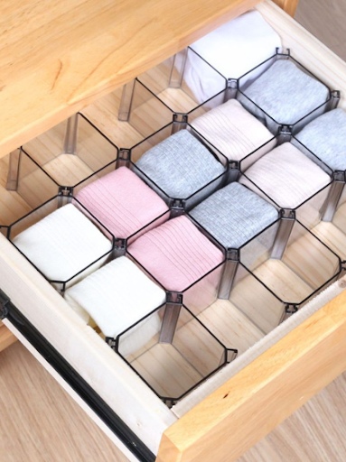 Plastic drawer dividers for neat organization.