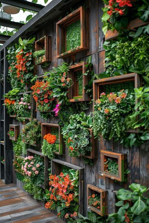 Wall-mounted wooden frames for vertical gardening with floral display.