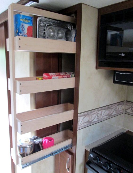 Pull-out pantry shelves for extra hidden storage.