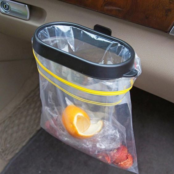 Bedside plastic bag holder as portable trash bin. 