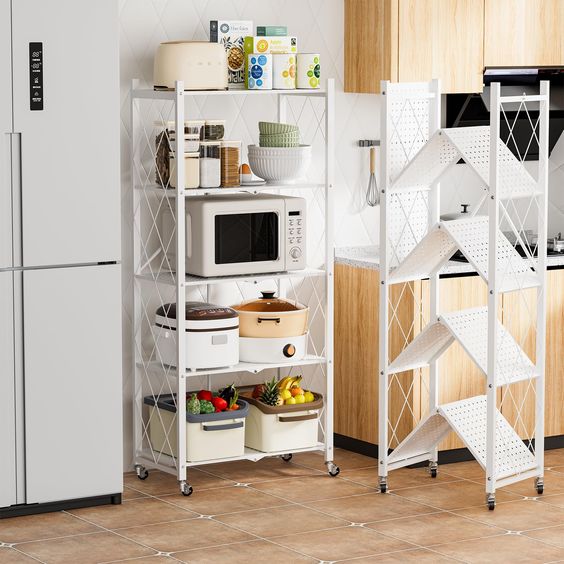 A white, foldable and expandable pantry rack.