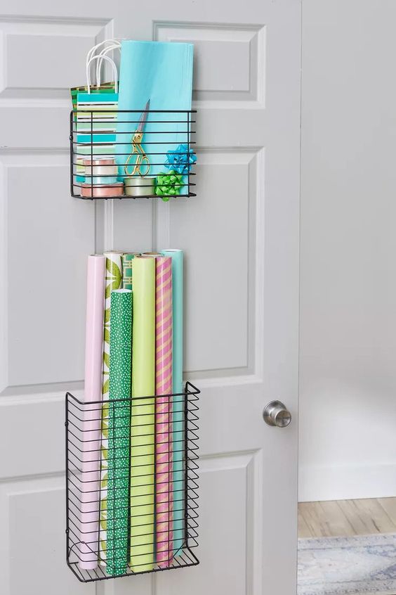 Over-the-door metal organizer to store charts and other art supplies.