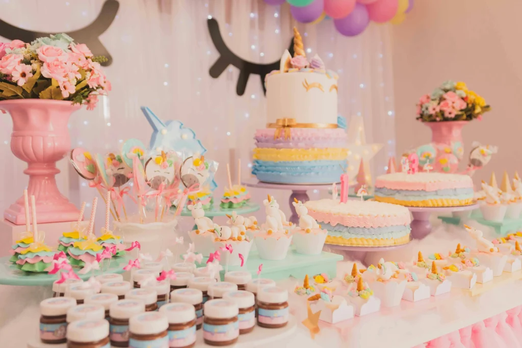 Barbie x Unicorn birthday party with pastel decor.