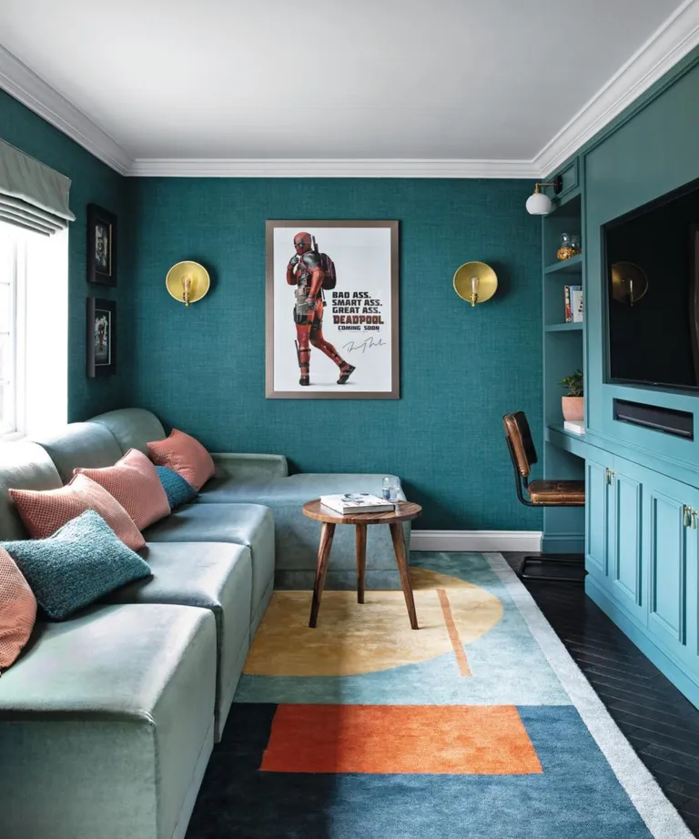 Theatre room with teal color pallette.
