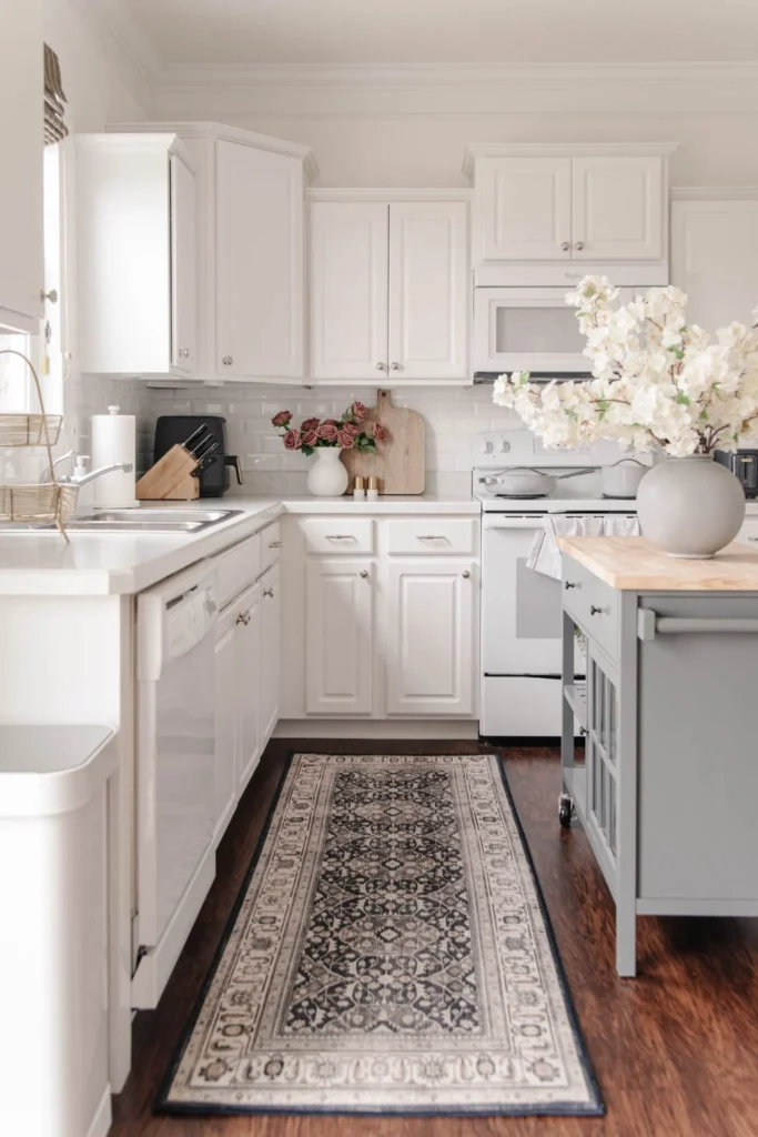 Open shelving in a white kitchen.