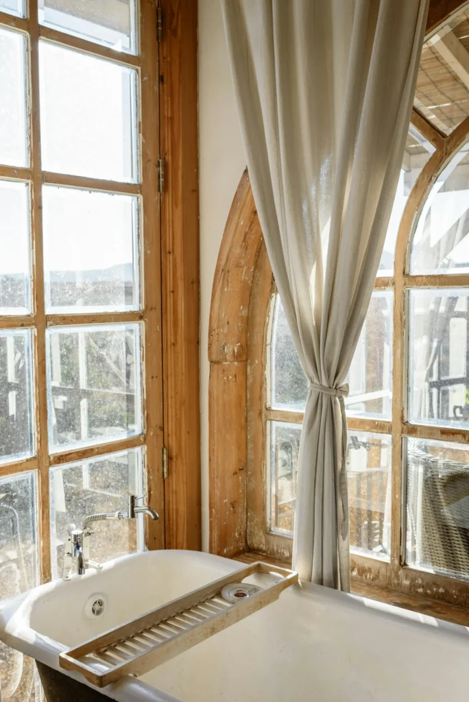 A top-floor view from a bathtub on the window-side.