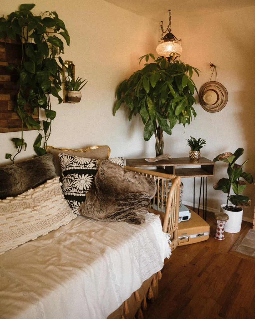 Cosy earthy living room nook with an eclectic touch of metal and muted accents.