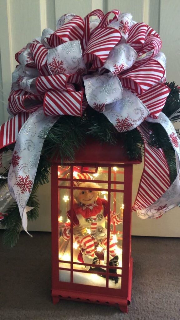 Santa Figurine Inside Lantern