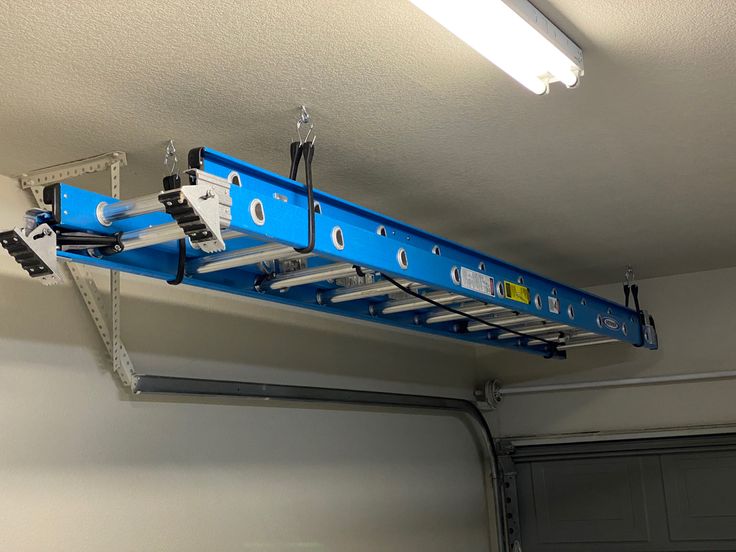Hang Ladders On Ceiling Tracks
