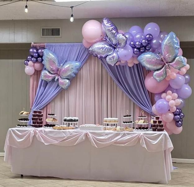 Hanging Paper Butterflies Over Dessert Table
